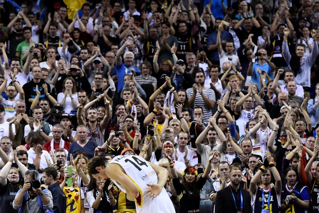 Germany's Dirk Nowitzki reacts after the EuroBasket group B match Germay vs Spain in Berlin on September 10, 2015. AFP PHOTO / TOBIAS SCHWARZ
